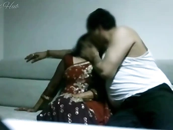 Indian Store Employee cheats on her hubby with her boss on the sofa