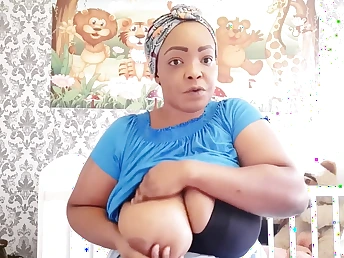 Step-mother Nigerian mom demonstrates off how to milk her immense black bra-stuffers