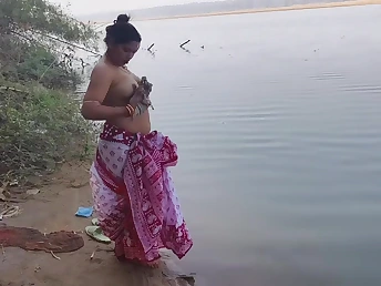 Desi Aunty gets wet & wild in put emphasize ocean surrounding her Indian village hubby