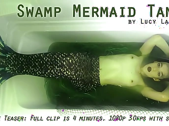 Lucy LaRue plays be imparted to murder role be advantageous to a Swamp Mermaid Tank in a super-hot solo have fun